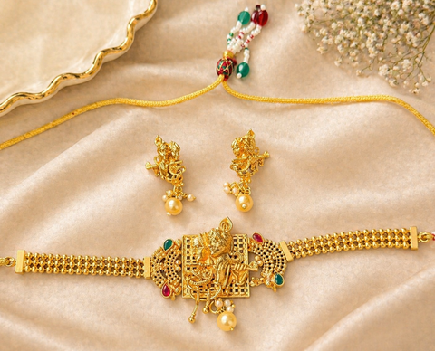 Beautiful Radha Krishna design Elegant gold temple-style choker with intricate deity detailing and pearl drop