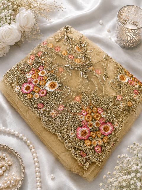 Heavy work designer Saree with netting base fabric and stones work design all over with heavy embroidery .The Blouse Worn By The Model Is For Reference Purposes Only. The Actual Blouse Piece Comes Attached With Saree(Slight Variations Are Possible)