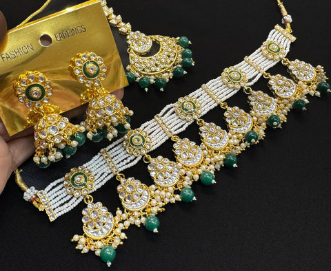 Kundan stone with pearls beaded choker set with beautiful earrings & tikka