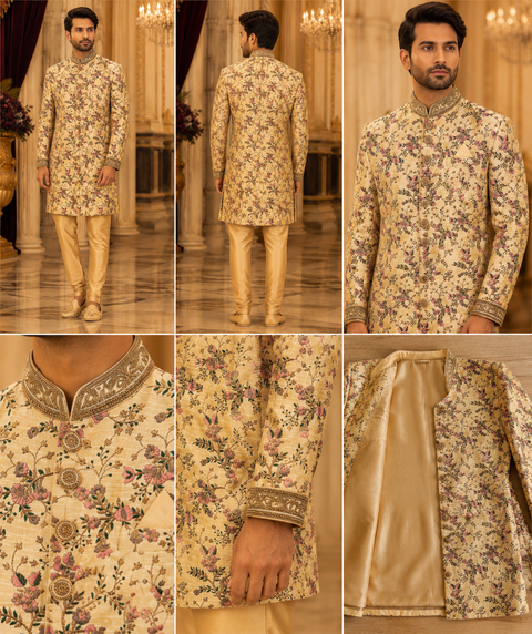 Premium ivory floral printed sherwani with intricate embroidered collar and cuff detailing, crafted for a sophisticated and elegant wedding celebration look. Slight variation in color and design may occur