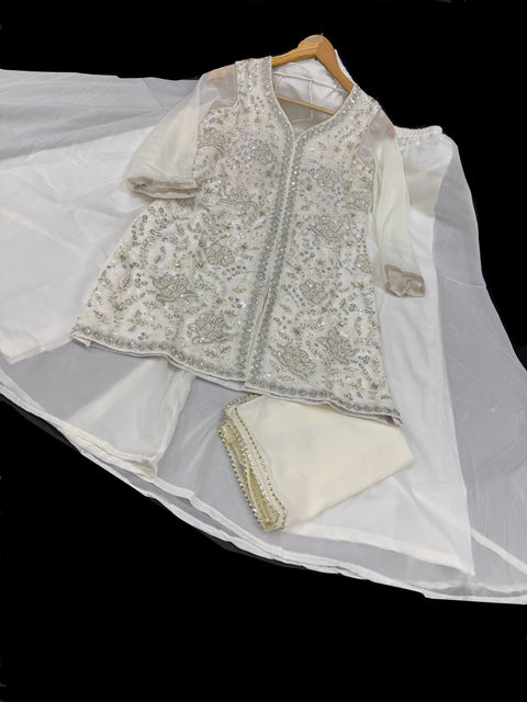 (Video clip attached) Cream color georgette based heavy hand work pearl beaded work with big flared plazo and georgette dupatta (size 38 and can be altered upto 40)