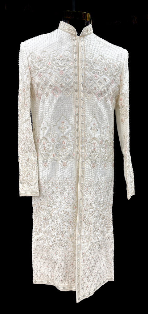 (Video clip attached )Cream color heavy embroidery & pearl sequined work all over with hand work pearl beaded neck, buttons and sleeves design Sherwani and Pants(waist belt for dupatta)