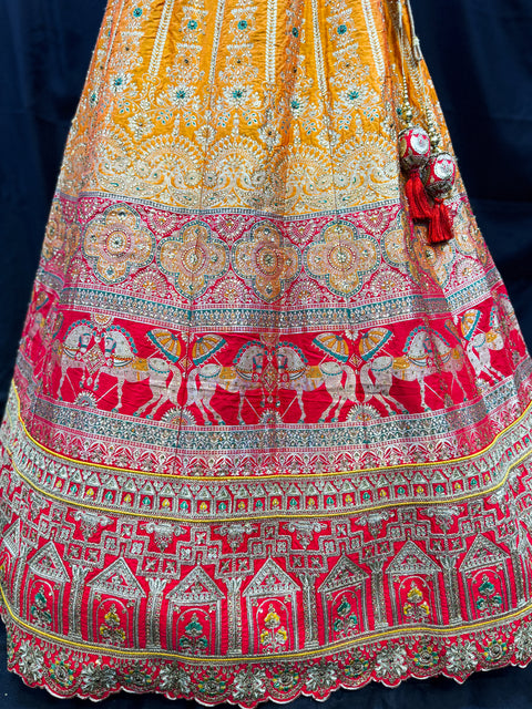 (Video clip attached)SIZE 42 (Upto 44))Mustard & Red Banarasi silk Based Beautiful hand Embroidery Work With Golden Fine Stones work heavy Ken Ken Designer semi/Bridal Lehnga With Heavy Tessels Attached To Blouse & Lehnga