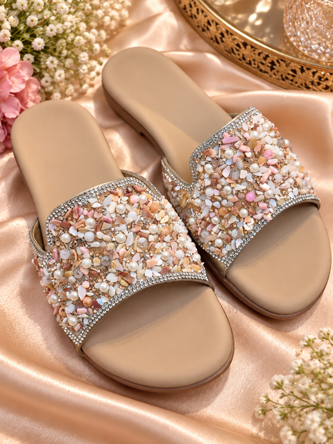 Beautiful beige flats with elegant shell and stone embellishment. Soft, stylish and comfortable for festive and party wear.