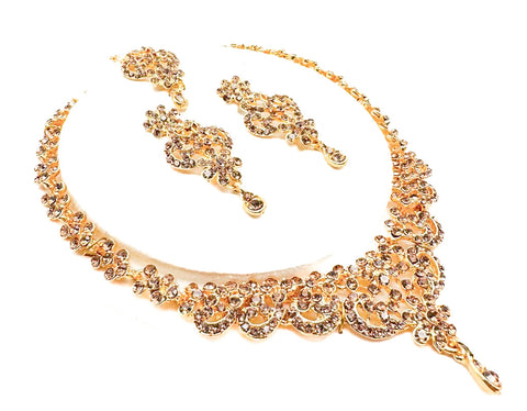 Golden color Jerkan stone studded beautiful necklace set with Earrings & Tikka