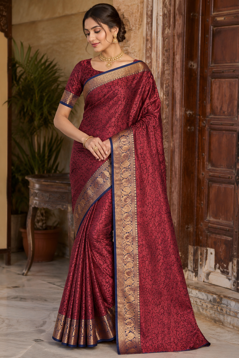 Soft Silk Saree with beautiful woven floral design and contrast zari border. Comes with stitched blouse (up to 44 inches). Perfect for festive and special occasions.
Note: Slight variation in color and design may be possible.