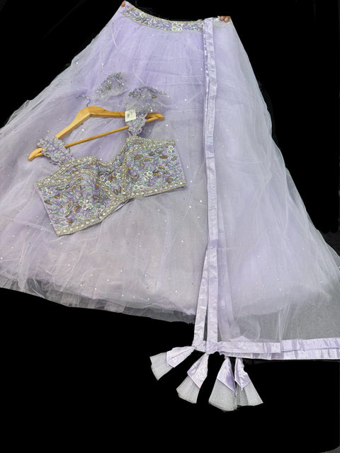 (Video clip attached)Heavy hand work designer stylish Blouse with very very heavy flared shiny netting based  princess style lehnga and dupatta