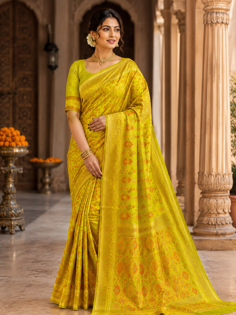 Elegant Soft Silk Blend Saree featuring intricate all-over woven motifs and a rich zari border. The lightweight fabric offers a graceful fall and comfortable drape, Blouse piece is attached with the saree. Slight variation in color and design may occur.