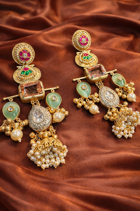 (Video clip attached)Trending Kashmiri Earrings /A stunning traditional Kundan-inspired statement earring featuring multi-tone stones and pearl hangings, perfect for weddings, festive occasions, and ethnic outfits