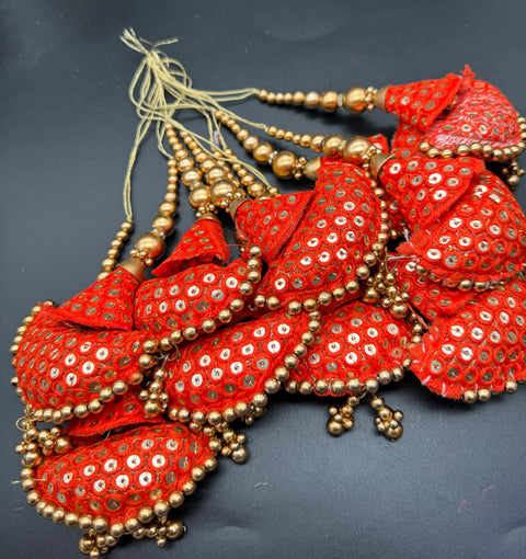 Beautiful cushioned design medium size lehnga latkans tessels (pair)