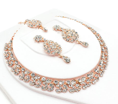 Rose gold color Jerkan stone studded beautiful necklace set with Earrings & Tikka