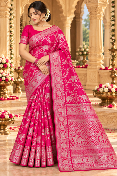 Luxuriously soft silk saree with a smooth, lightweight feel and beautifully flowy drape. Featuring rich woven zari floral motifs and an elegant detailed border .Blouse piece included. Slight variation in colour and design is possible.