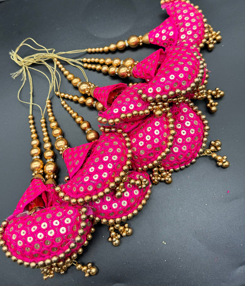Beautiful cushioned design medium size lehnga latkans tessels (pair)