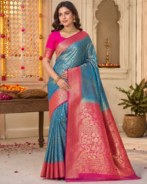 Premium soft Silk Saree with rich zari weaving and contrast woven pallu. featuring elegant dual-tone shades.Model-worn blouse is for reference only. Unstitched blouse piece is attached with saree(slight variation in color & design is possible)