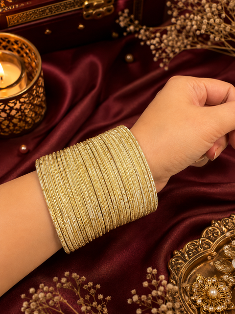 Golden Shimmer dotted metal bangles 2 dozen in 1 Set (slight variation in color & design may occur)