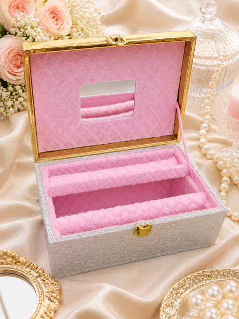 Elegant Pink & Silver Jewellery Box.Beautifully crafted with a sparkling silver exterior, luxurious gold detailing and soft pink velvet compartments—perfect for keeping your bangles and jewellery organised in style
Approx. Size: 25 × 17 × 14 cm