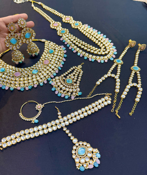 (video clip attached)Pastel Pink & Blue Beautiful uncut Kundan stones with pearls studded very Heavy work necklace with beautiful Jhumka Passa, Sheesh Patti attached to tikka ,Hand Jewellery and Nath NOTE:- original Kundan stones not fake plastic stones)