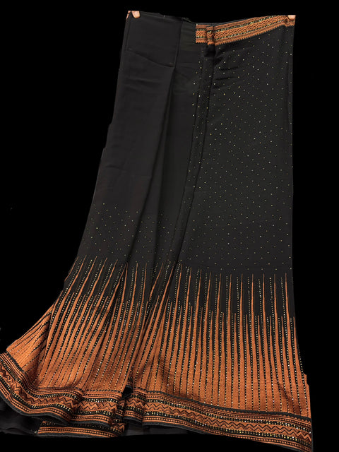 Black color Pure georgette base all over fine stone work beautiful saree  With Fully Stitched Padded Blouse (With Back Hook)& Attach Tessels Size 42(Can Be Altered Upto 46)Saree Pleates Stitch As Well