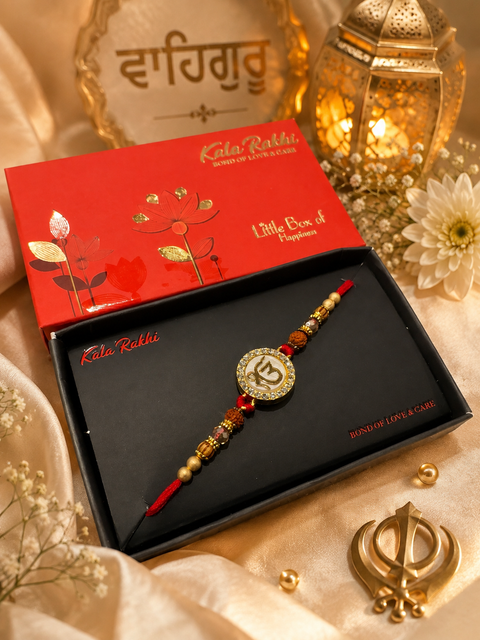 Beautiful Waheguru Rakhi featuring a spiritual centrepiece, Rudraksha beads and elegant gold accents. A meaningful choice to celebrate Raksha Bandhan with blessings, love and tradition.