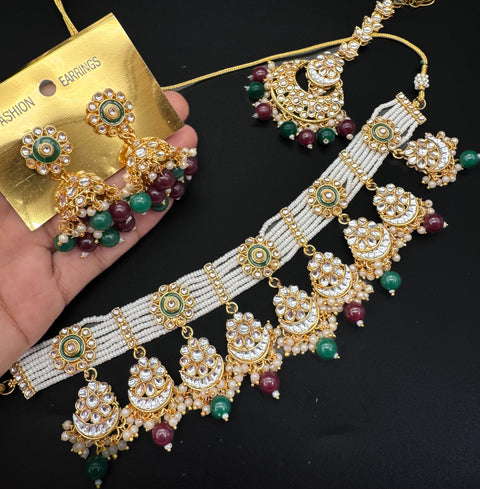 Kundan stone with pearls beaded choker set with beautiful earrings & tikka