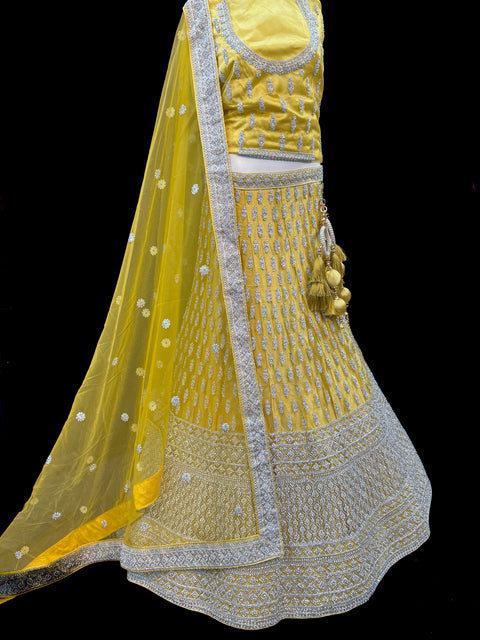 (Video clip attached)SIZE 42 (Upto 46))Lite Mint colour netting Based Beautiful Embroidery Work With Golden Fine Stones& beaded pearl work Very Heavy Layered Designer semi/Bridal Lehnga With Heavy Tessels Attached To Blouse & Lehnga