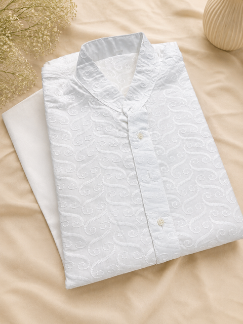 White colour cotton  based chikankari work kurta with white pajama(slight variation in color and design is possible)