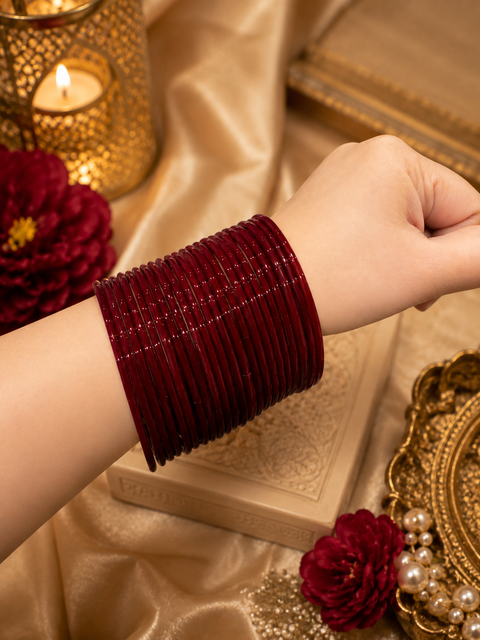 Beautiful Maroon plain glass bangles. Each set includes 2 dozen bangles. Price is per set. Slight colour variation may occur.