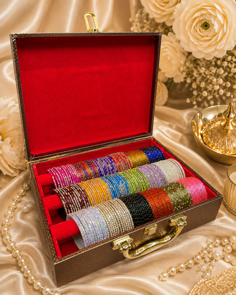 Beautiful mirror-work bangle box with a rich red interior and 3 spacious rows. Bangles are not included and are shown for display only. Fill it with your own bangles or shop our beautiful bangle collection online.
Approx. Size: 34 × 25 × 9.5 cm.