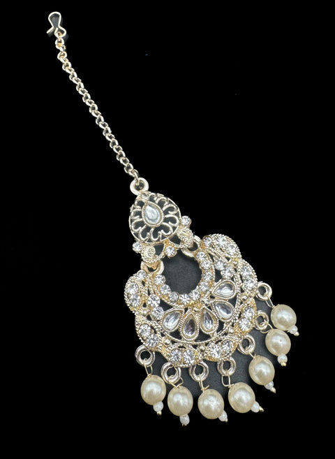 Lite gold color kundan with pearl work beautiful tikka
