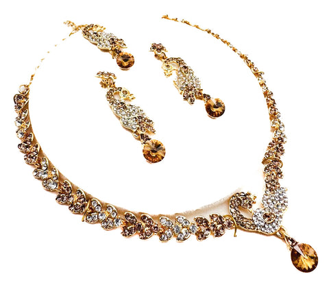 Golden color Jerkan stone studded beautiful necklace set with Earrings & Tikka