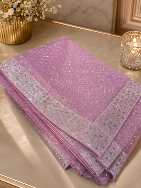 Shimmering saree featuring an all-over sparkle weave and dazzling sequin border, paired with a matching glitter blouse for an effortlessly glamorous party look(size 38-40 )slight variation in color and design is possible)