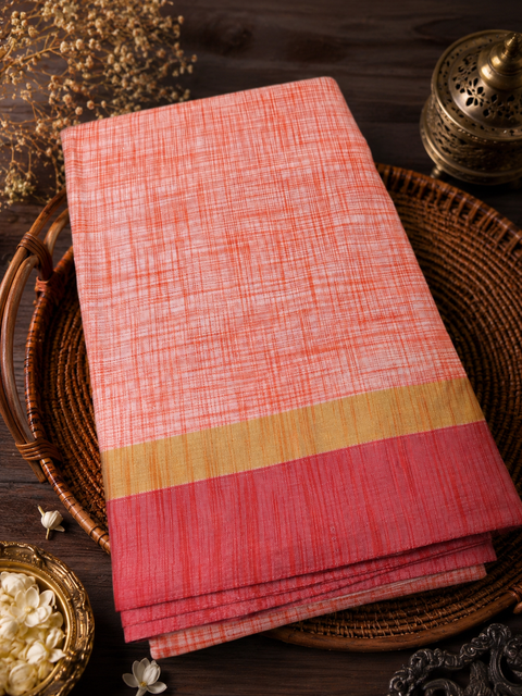 Soft linen-blend saree with a beautiful textured finish and contrast border, offering a graceful blend of comfort and timeless style,Comes with an unstitched running blouse piece attached to the saree (slight variation in color and design is possible