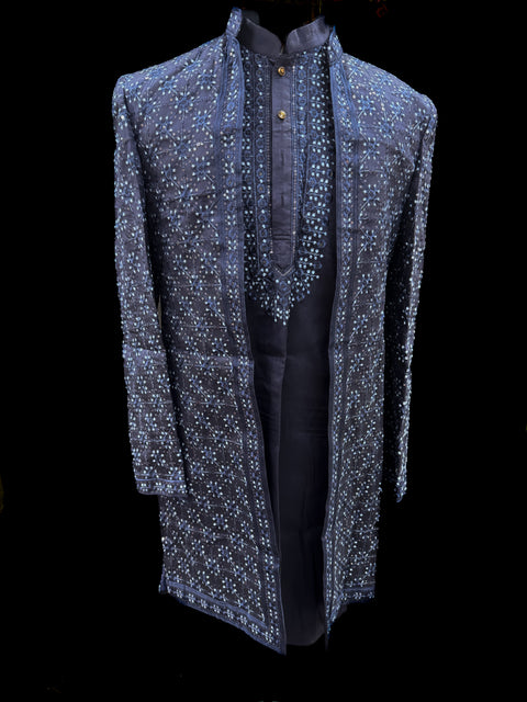 (Video clip attached)Dark Navy Blue Raw silk based heavy embroidery work with all over sequinned work Jacket style Mens classy Indo western with (half sleeves Kurta ) and Pants