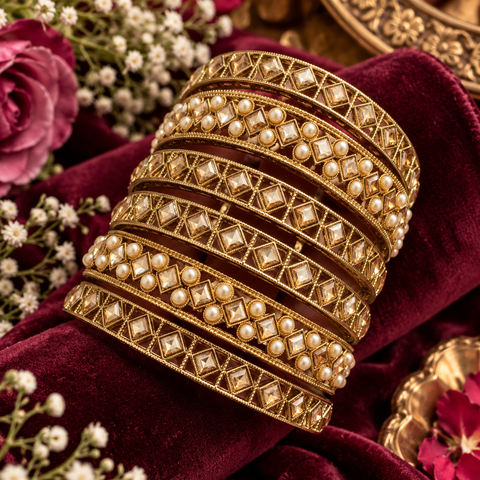 Beautiful bangle set featuring sparkling polki stones (Slight variations in color & design is possible )