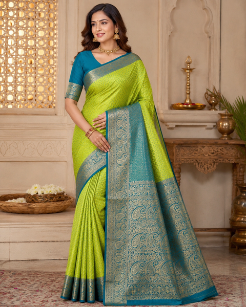 Premium soft Silk Saree with rich zari weaving and contrast woven pallu. featuring elegant dual-tone shades.Model-worn blouse is for reference only. Unstitched blouse piece is attached with saree(slight variation in color & design is possible)