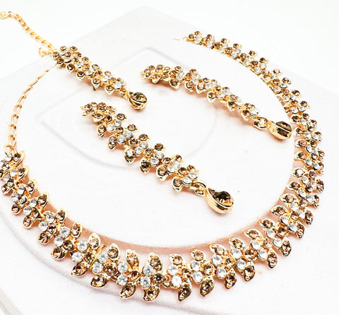 Golden color Jerkan stone studded beautiful necklace set with Earrings & Tikka