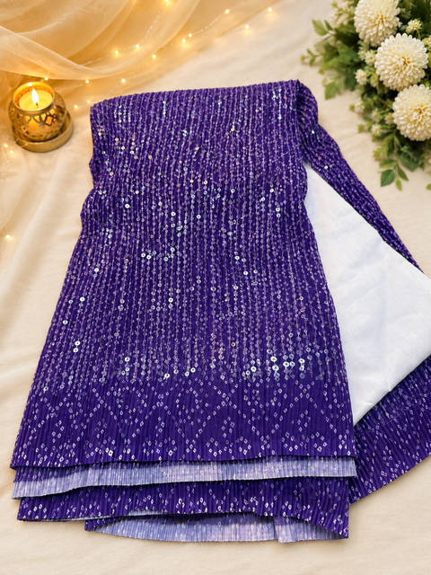 Crushed Georgette Saree with All-Over Sequin Work. Lightweight, elegant and perfect for festive & party wear. Comes with an unstitched blouse piece.Model blouse is for reference only. Slight variation in color and design may be possible.
