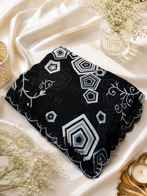 Beautiful black Stones work border design beautiful very soft Georgette Saree. The Blouse Worn By The Model Is For Reference Purposes Only. The Blouse Piece Is Attached Separately With The Saree. Slight Variation In Color And Design May Occur.