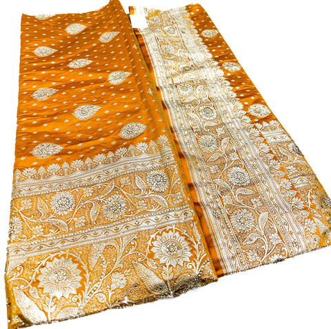 Beautifully designed Banarasi Silk Saree with heavy Handwork with stones & Zari