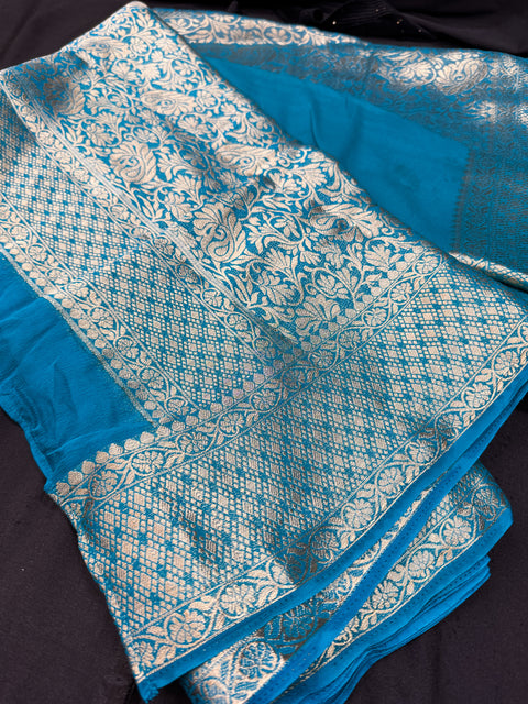 Pure Georgette based heavy zari border work all on borders and on Pallu (fully stitched blouse size 42 (altered upto 46, padded and back hook)