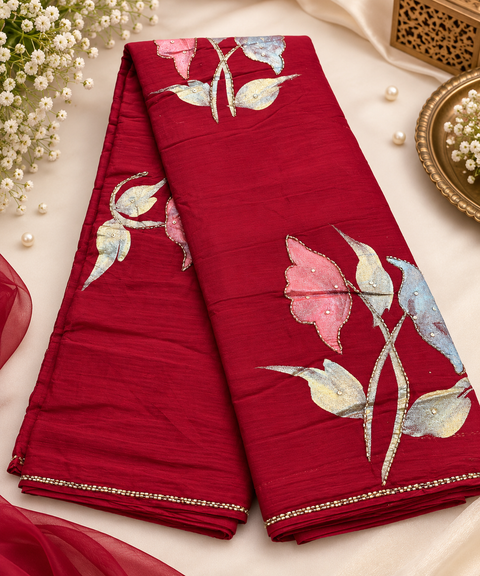 Soft Chiffon Saree with all-over shimmery floral print and delicate handwork detailing. Lightweight, soft and beautifully draping. Blouse piece attached; model blouse is for reference only. Slight variation in colour and design is possible.