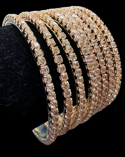 Golden  Crystal stones bangles set (price per set) per set 8 bangles ) perfect to match with plain velvet/metal bangles