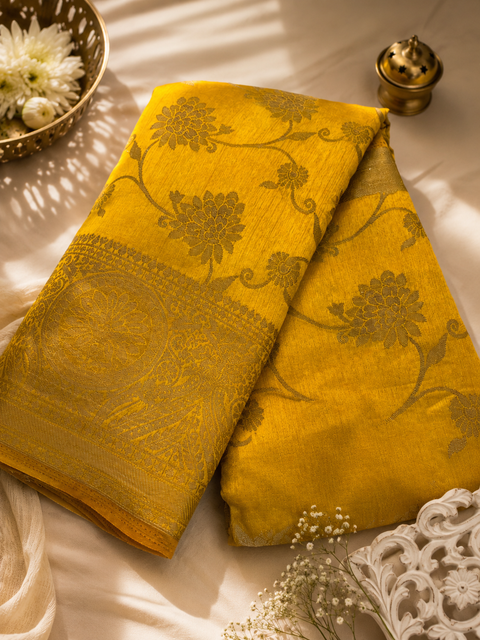 Graceful Silk Saree Featuring Elegant Zari Weaving, A Rich Texture, And A Structured Drape . Attached Blouse Piece Included. Slight Variation In Colour And Design May Occur.