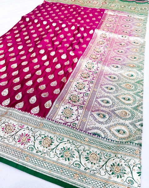 Beautifully designed Banarasi Silk Saree with heavy Handwork with stones & Zari