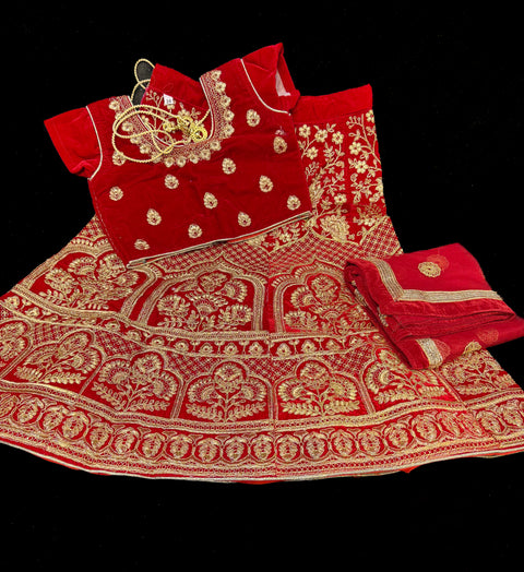 Red colour velvet based heavy embroidery lehnga & netting embroidered dupatta
