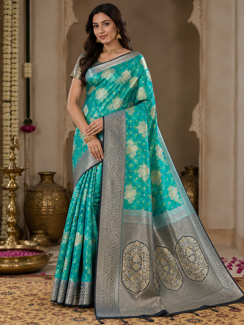 Premium two shaded Silk Saree with rich zari weaving and contrast woven pallu. featuring elegant dual-tone shades.Model-worn blouse is for reference only. Unstitched blouse piece is attached with saree(slight variation in color & design is possible)