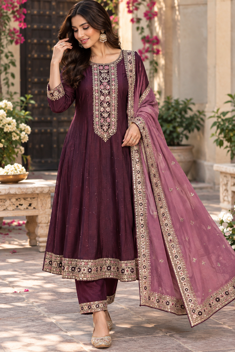 Rayon Silk/Georgette Silk Anarkali Suit featuring beautiful embroidery on the neckline and kurta, with a soft flattering flare & matching pants and a Chinon dupatta finished with elegant embroidery.Slight variation in colour and design is possible