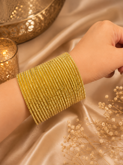Golden Shimmer dotted metal bangles 2 dozen in 1 Set (slight variation in color & design may occur)
