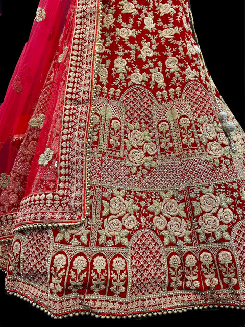 (Video clip attach)size 42(upto 46) fully stitched Red color full of embroidery and stones work blouse and all over heavy multi flared bridal wear lehnga with heavy work dupatta