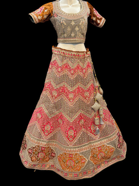 (Video Clip attached)size 40 (upto 44) Velvet based hand work with stones work two toned design Heavy Ken ken Bridal designer lehnga with heavy handwork blouse with netting heavy work dupatta and heavy latkans